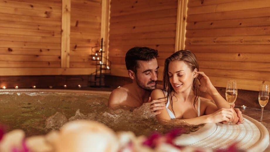 couple in a hot tub spa