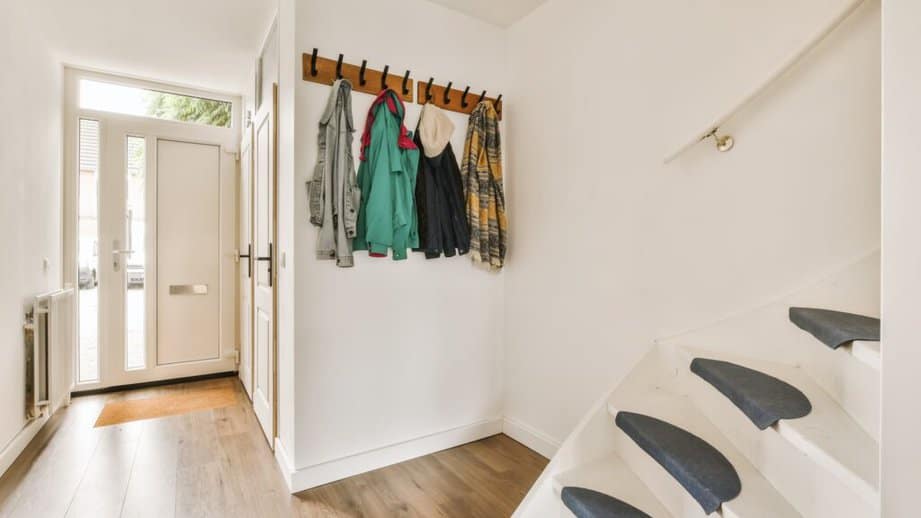 coat rack near front door of house