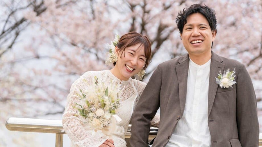 japanese couple outside in wedding clothes