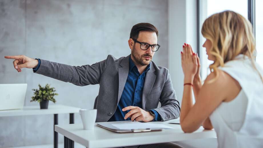 boss yelling at female employee