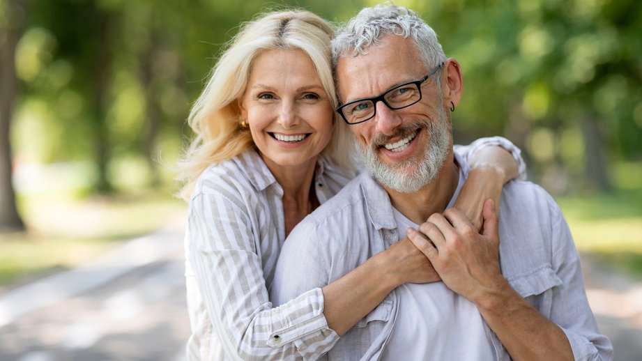 happy older couple outside