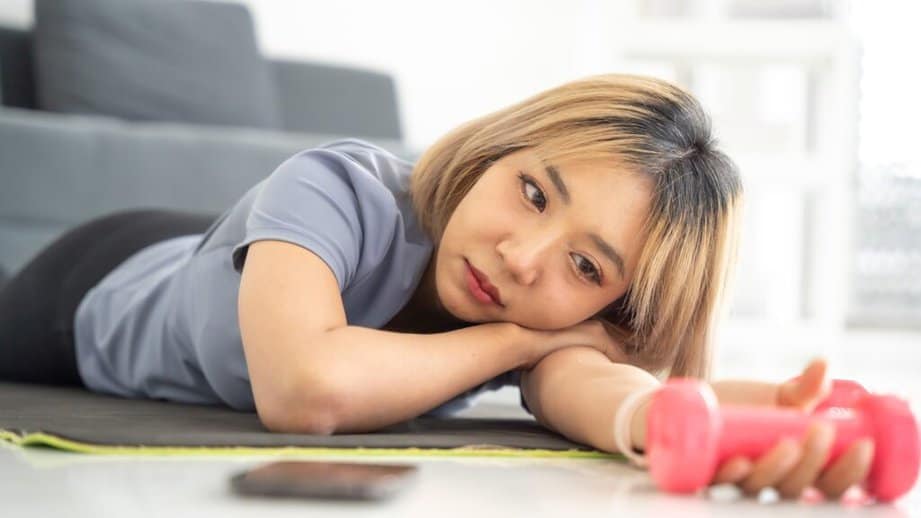 woman bored when exercising