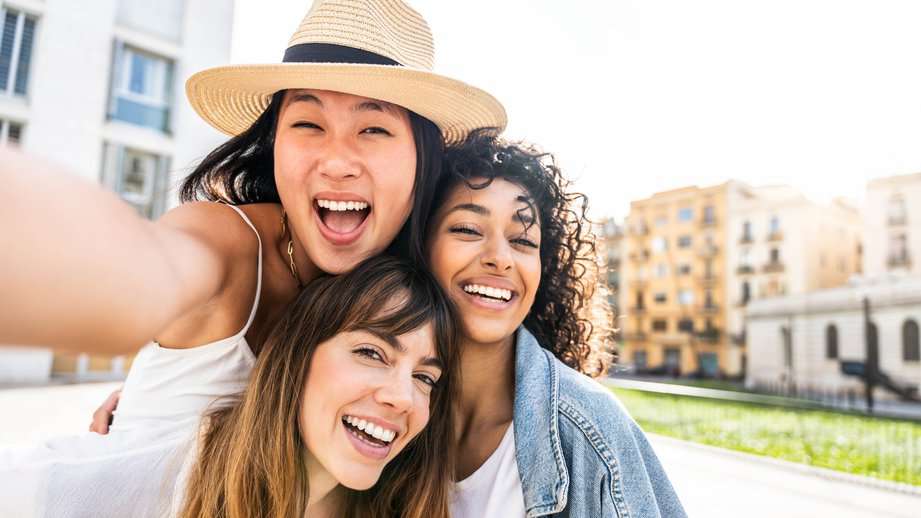 group of three happy women