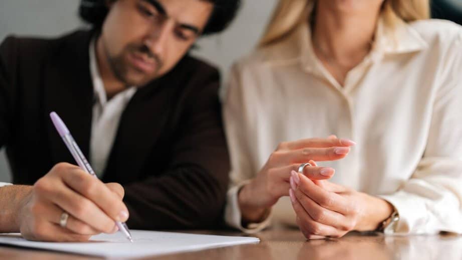 couple getting divorced and taking off ring