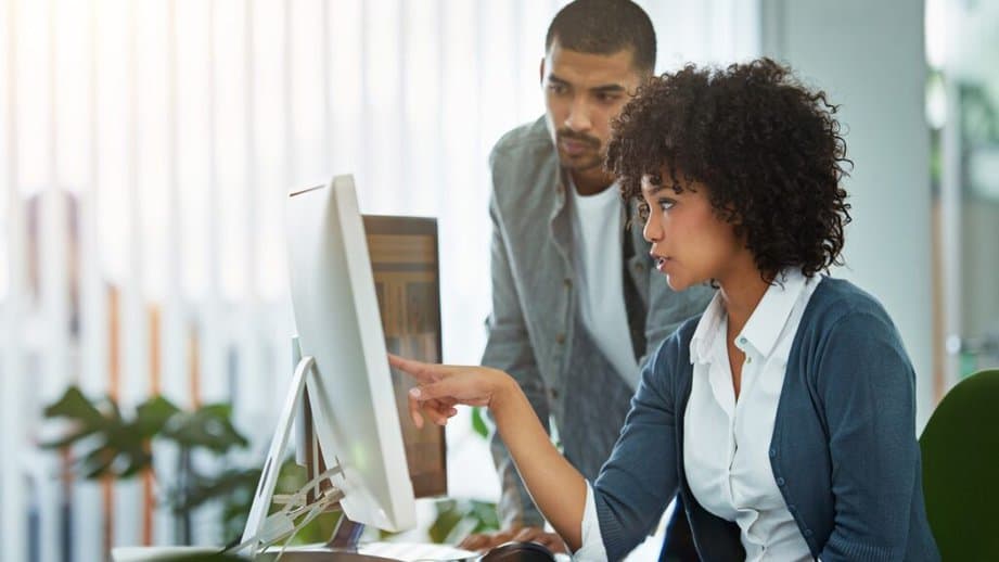 woman at work looking at a computer