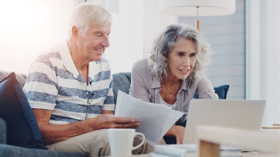 older couple working on a computer