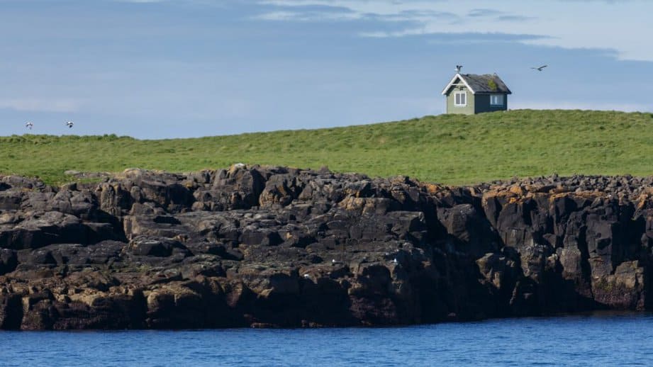 small house on the cliffs of Flatey Ireland