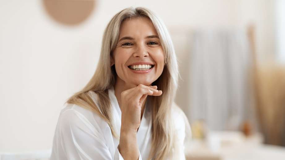 happy woman looking fresh faced and smiling