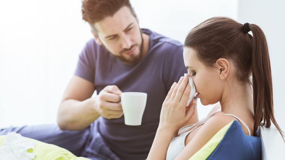 husband taking care of sick wife